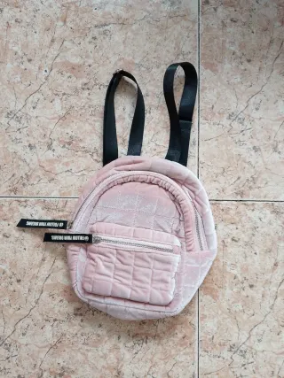 Mochila rosa acolchada