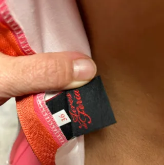 Traje de flamenca rosa con volantes