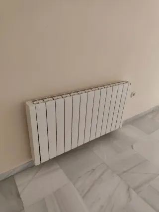 Radiadores Eléctricos Beige y Blanco