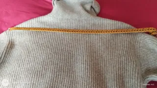 Maglione grigio collo alto