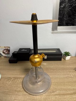 Máquina de humo dorada