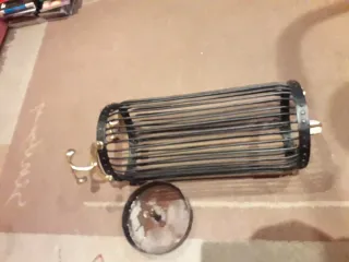 Paragüero vintage metal negro y dorado