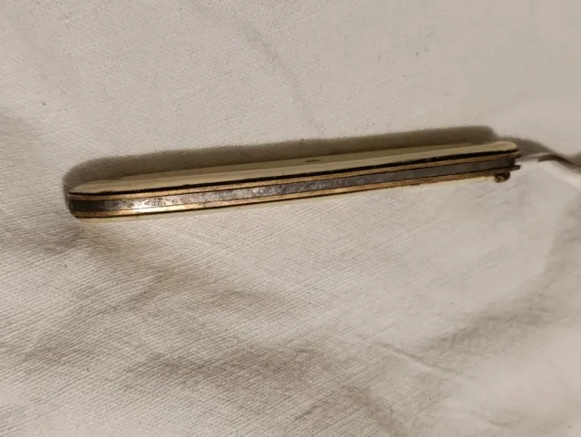 Tenedor plegable IHER años 40-50