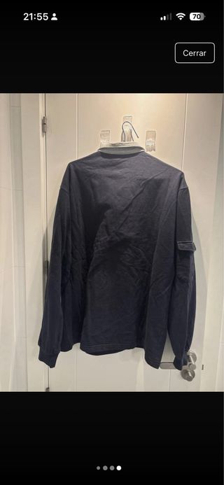 Polo New Balance azul media cremallera