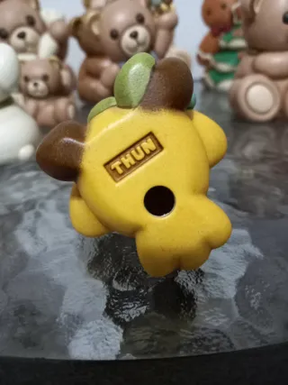 Pulcino Thun con fiore piccolo