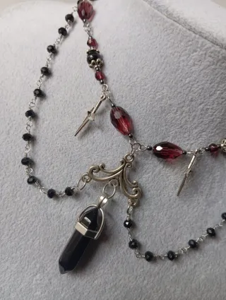 Collana in acciaio inox e ciondolo in Ossidiana.