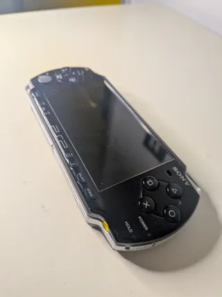 Sony PSP 2004 Nera + Giochi e Accessori