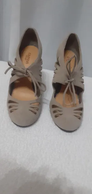 Décolleté beige con lacci