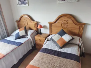 Dormitorio madera maciza