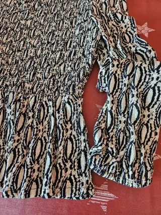 Blusa elegante estampada