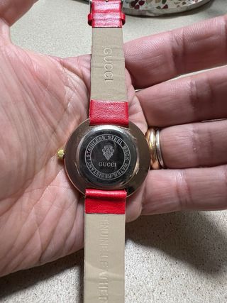 Orologio molto bello Con brillantini girevoli.