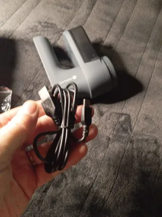 Quita pelusas eléctrico