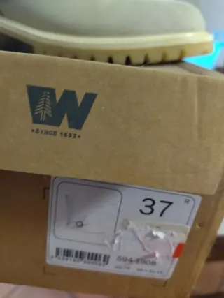 Stivaletti imbottiti con fibbia