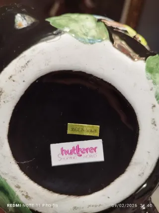 Juego de té de cerámica con loros