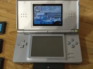 Nintendo DS Lite Plata + 4 Juegos