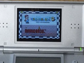 Nintendo DS Lite Plata + 4 Juegos