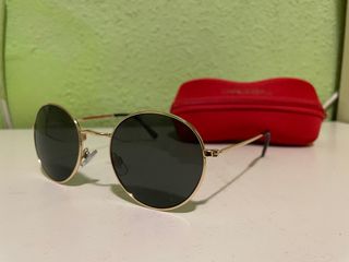Gafas de sol doradas redondas