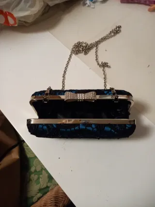 Pochette da sera con tracolla a catena