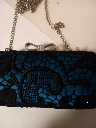 Pochette da sera con tracolla a catena