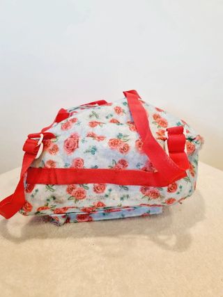 Mochila Juguettos niña azul cielo rosas