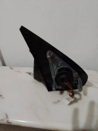 Espejo y mecanismo Peugeot 206 azul,sin estrenar