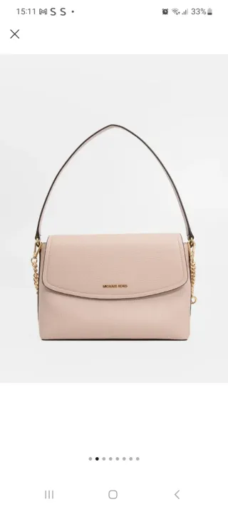 Borsa Michael Kors rosa con dettagli oro