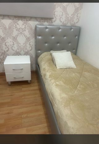 Cama individual tapizada
