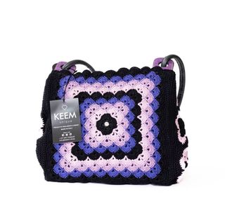 Borsa realizzata a mano con tecnica crochet.