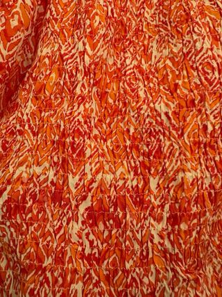 Blusa naranja mangas abullonadas verano