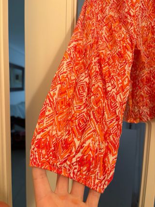 Blusa naranja mangas abullonadas verano