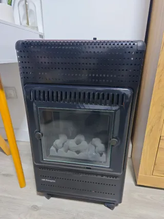 Estufa gas llama azul imitación leña y fuego real