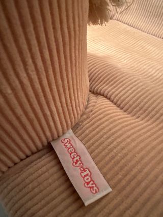 Caballito balancín de peluche y madera