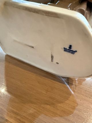 Figura Lladro de un joven con barril.