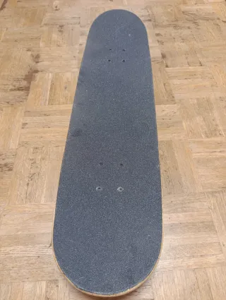 Skate Oxelo con diseño de mono y calavera