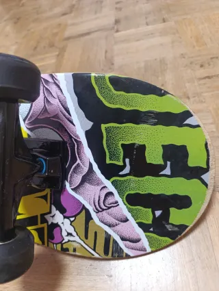 Skate Oxelo con diseño de mono y calavera