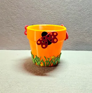 Vasetto decorativo arancione con coccinella