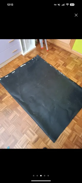 Alfombra protectora de plástico negra