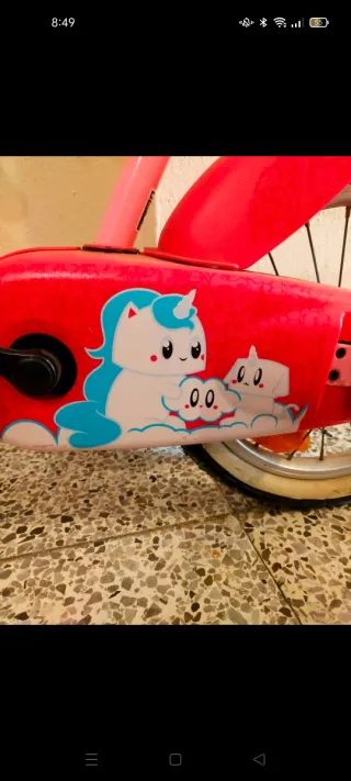 Bicicleta infantil rosa con unicornios