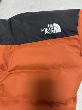 Chaqueta The North Face Negra y Naranja