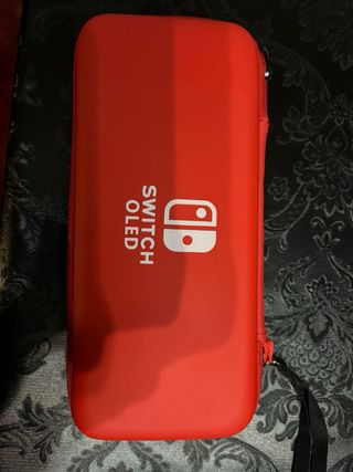 Nintendo Switch OLED Neon + Juegos preguntar