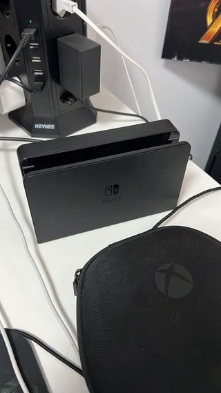 Nintendo Switch OLED Neon + Juegos preguntar