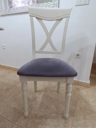 Mesa redonda blanca extensible con tapa de cristal