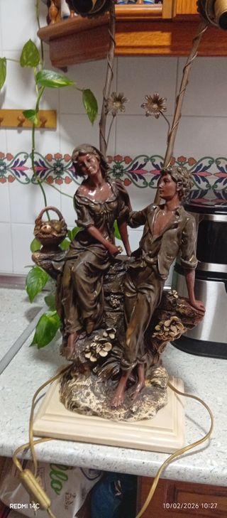 Lampara de bronce tallada