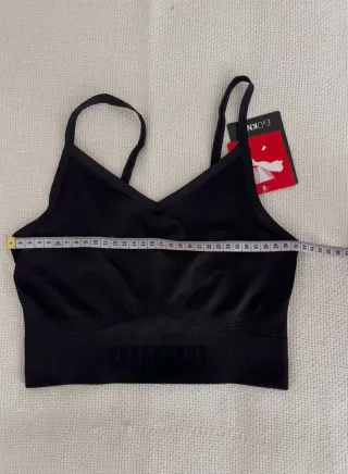 Top deportivo Puma negro nuevo con etiqueta