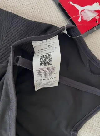 Top deportivo Puma negro nuevo con etiqueta