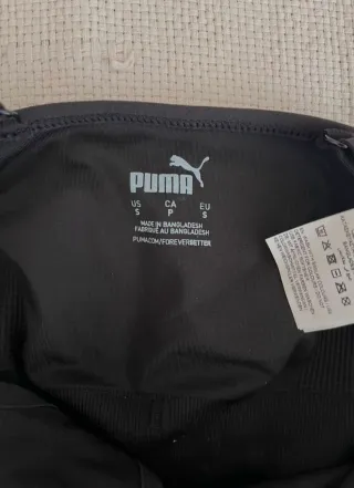 Top deportivo Puma negro nuevo con etiqueta