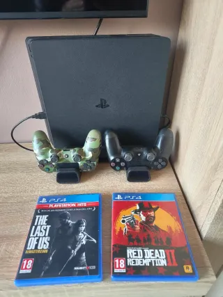 PS4 (PlayStation 4) Negra + 2 mandos + 2 juegos