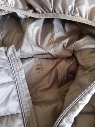 Piumino ragazzo grigio con cappuccio