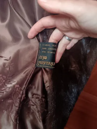 Abrigo de piel marrón talla g equivale 56