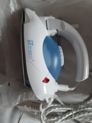 Plancha de viaje blanca